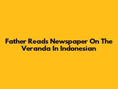 Father Reads Newspaper On The Veranda In Indonesian